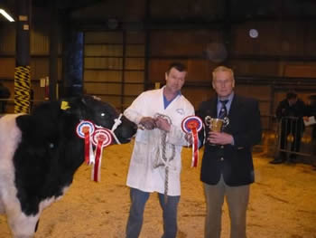 Brian Griffiths with the judge after being awarded overall Champion Blue with Pengelli David